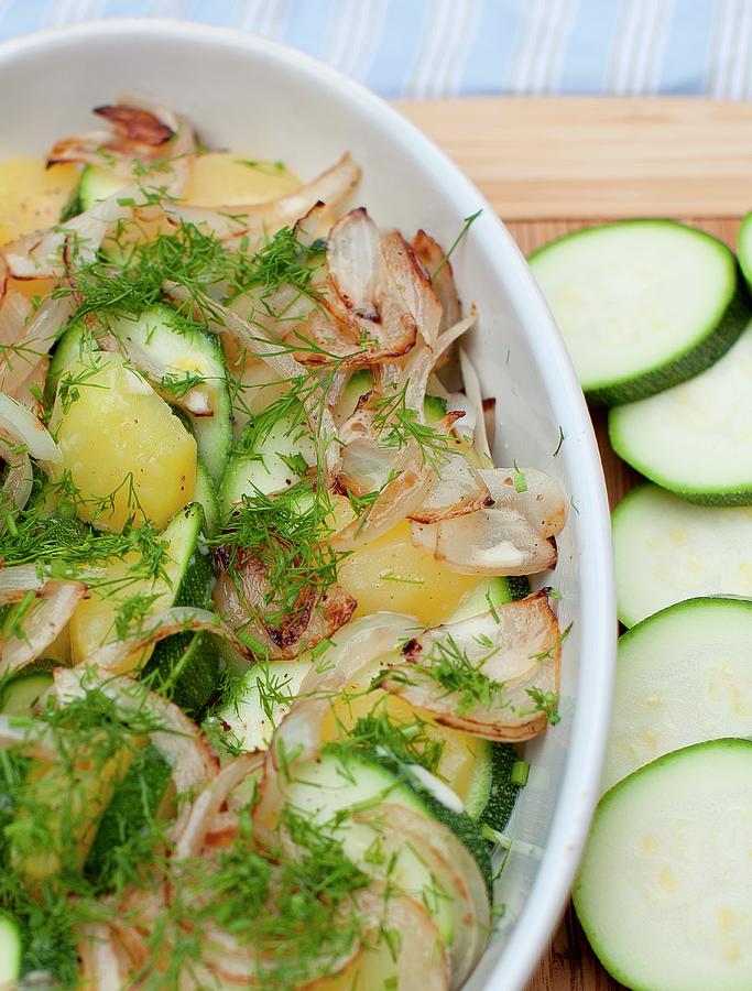 Summer Zucchini And Onion Tian In A Casserole Dish Photograph by Strokin, Yelena
