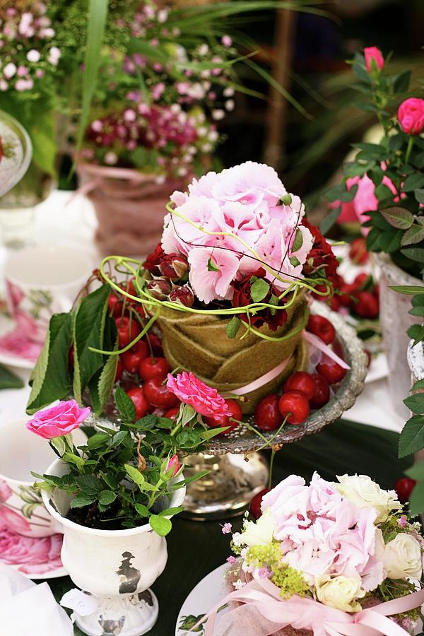 Summery Arrangement Of Hydrangeas, Roses And Cherries Photograph by Alexandra Panella