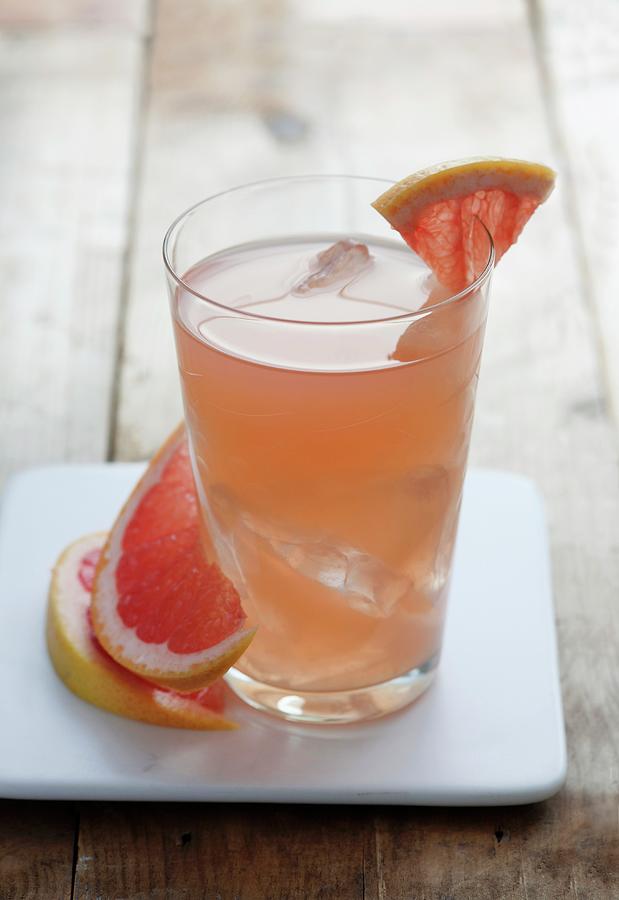 Cube Photograph - Summery Grapefruit Juice With Ice Cubes by Victoria Firmston
