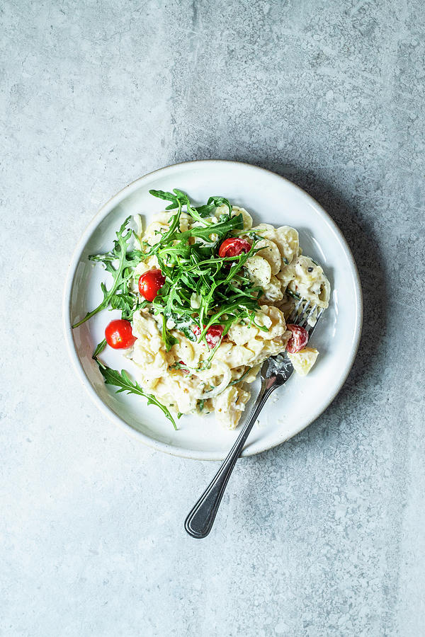 Summery Potato Salad With Tomatoes And Arugula Photograph by Simone Neufing