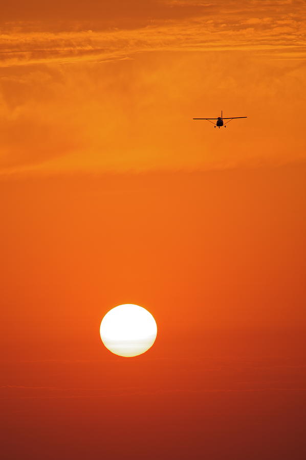 Sun And Little Airplane Photograph by Arsen Alaberdov