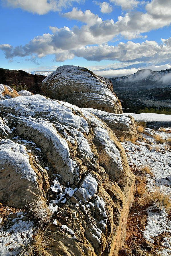 Sun Light Snow Covered Boulders in Colorado National Monument Photograph by Ray Mathis