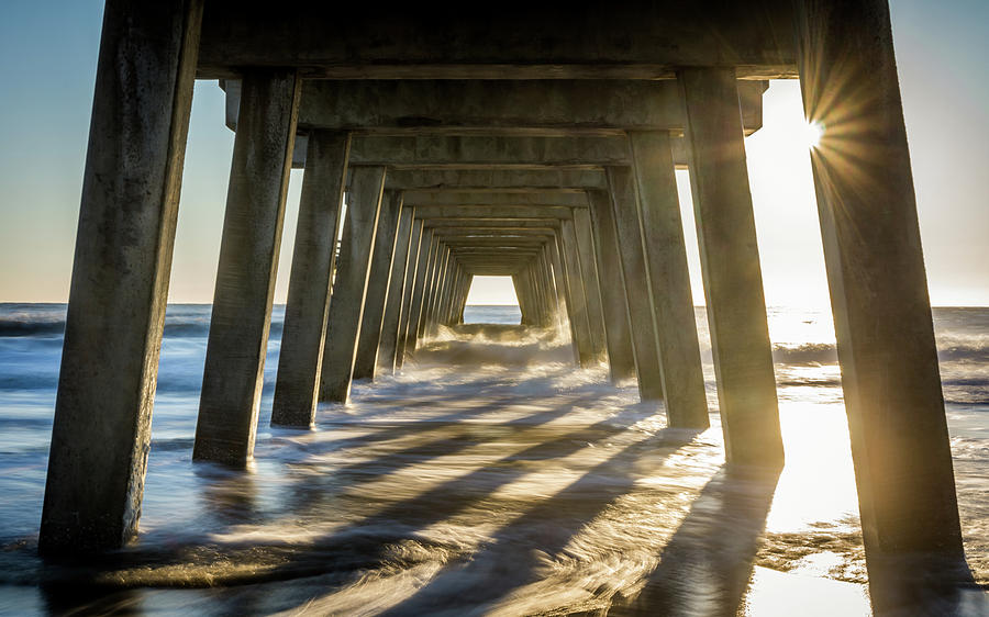 Sun Rays under the Pier Photograph by Framing Places