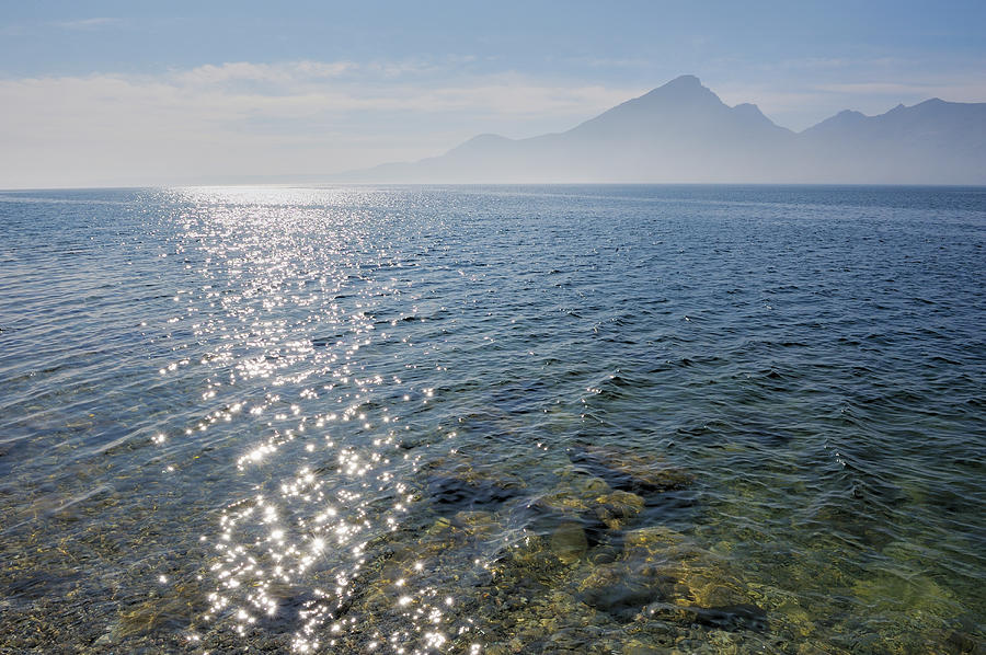 Sun Reflection In Water At Lake Garda Photograph by Martin Ruegner