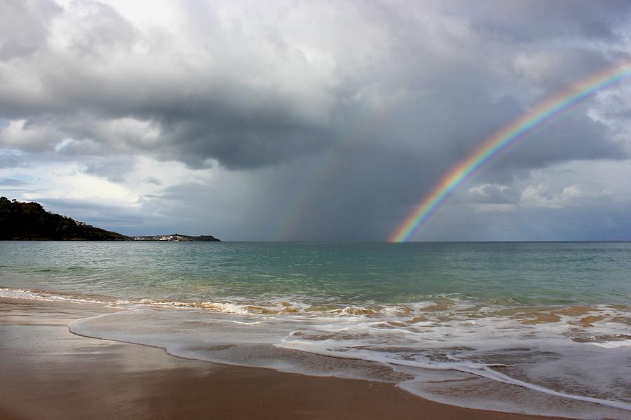 Sun, Sea And Showers Over Carbis Bay Photograph by Andrew Turner