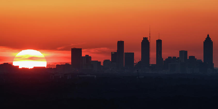 Sun setting on Atlanta Photograph by Murray Rudd
