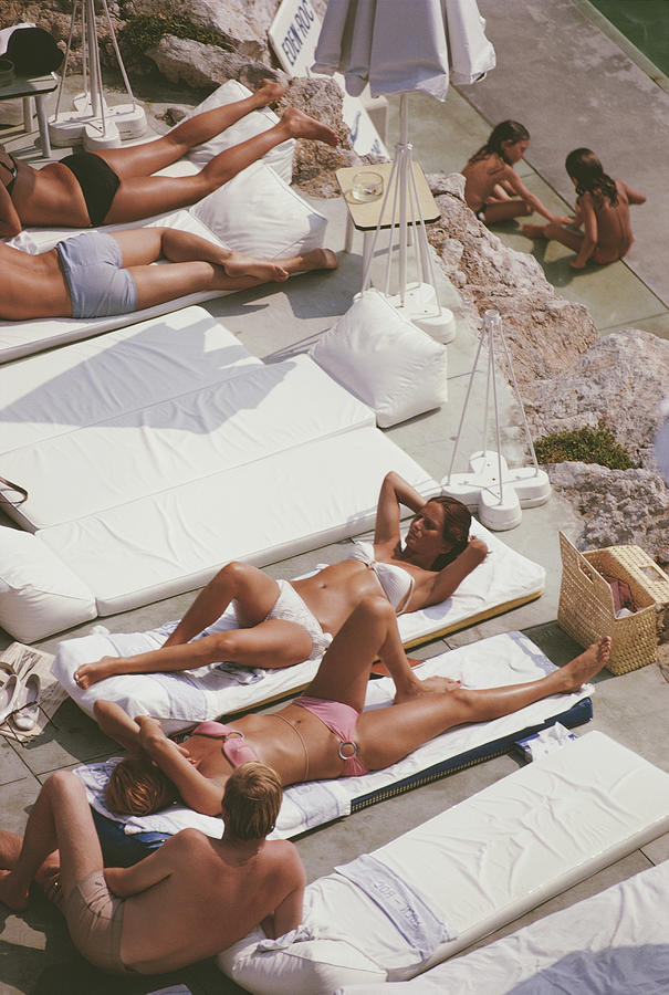 Sunbathers At Eden Roc Photograph by Slim Aarons