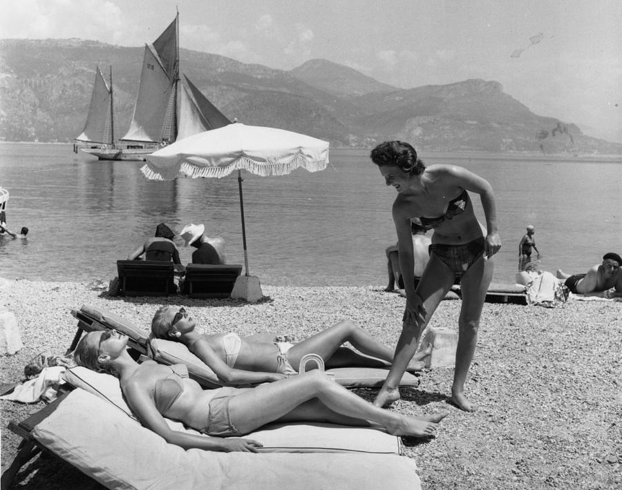 Sunbathing On Beach Photograph by Bert Hardy