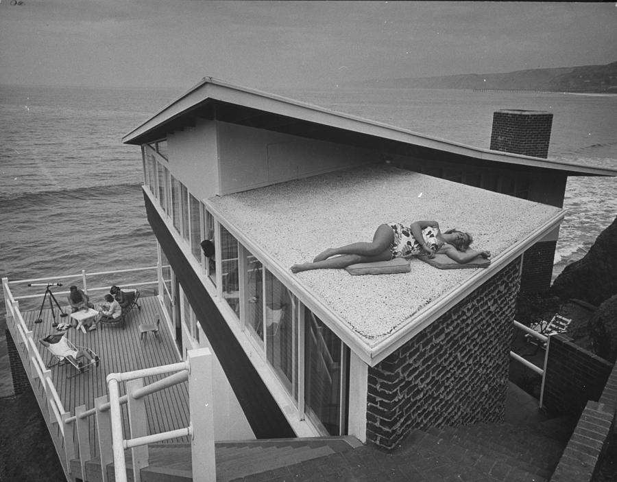Architecture Photograph - Sunbathing on Roof by Peter Stackpole