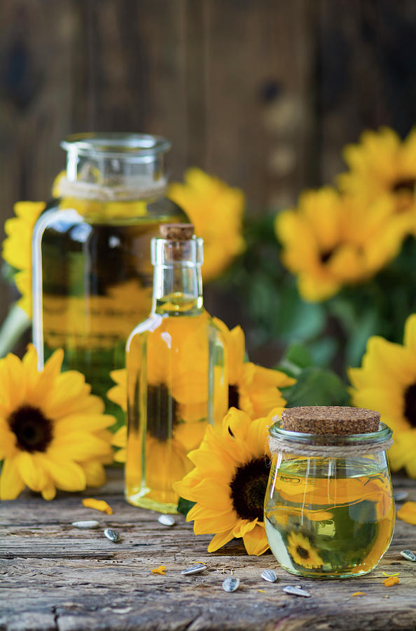 Sunflower Oil In Various Glass Containers Photograph by Joanna Lewicka