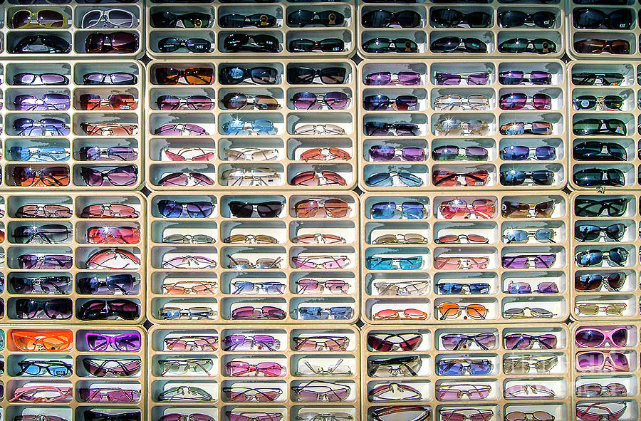 Sunglass Display Rack Photograph by David Zanzinger
