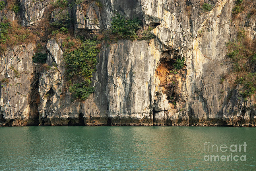 Sunlit Cliffs in Halong Bay Photograph by Bob Phillips