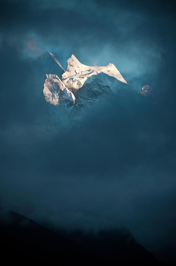 Sunlit Snow Himalaya Peak Dark Swirling Photograph by Fotovoyager Sunlit Snow Himalaya Peak Dark Swirling Photograph by Fotovoyager