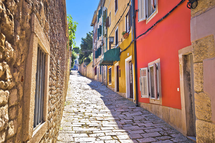 Sunny colorful stone street of ancient Pula view Photograph by Brch Photography