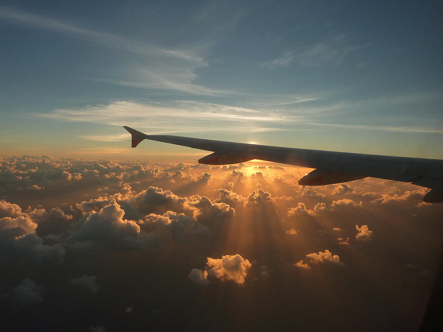 Sunrise At 35,000ft Photograph by E Woolley Sunrise At 35,000ft Photograph by E Woolley