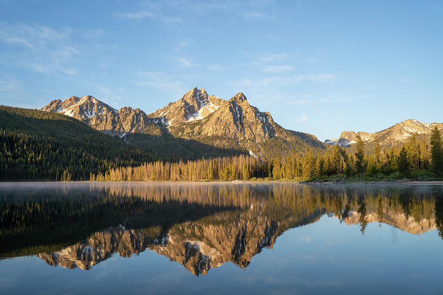 Sunrise at Stanley Lake with Sawtooth Mountains reflecting in th ...