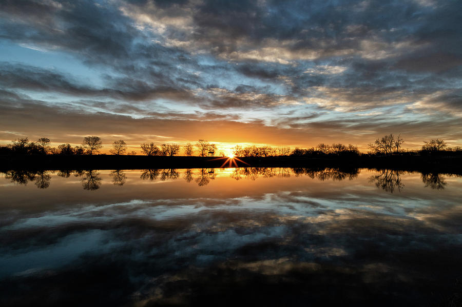 Sunrise Bursts Over a Pond Photograph by Tony Hake