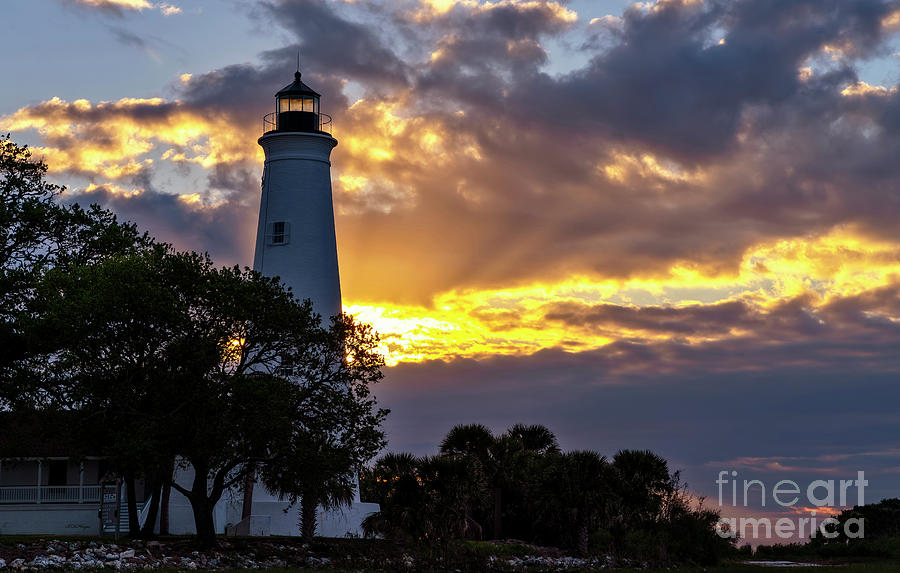 Sunrise Glow In The Lighthouse Photograph by DB Hayes