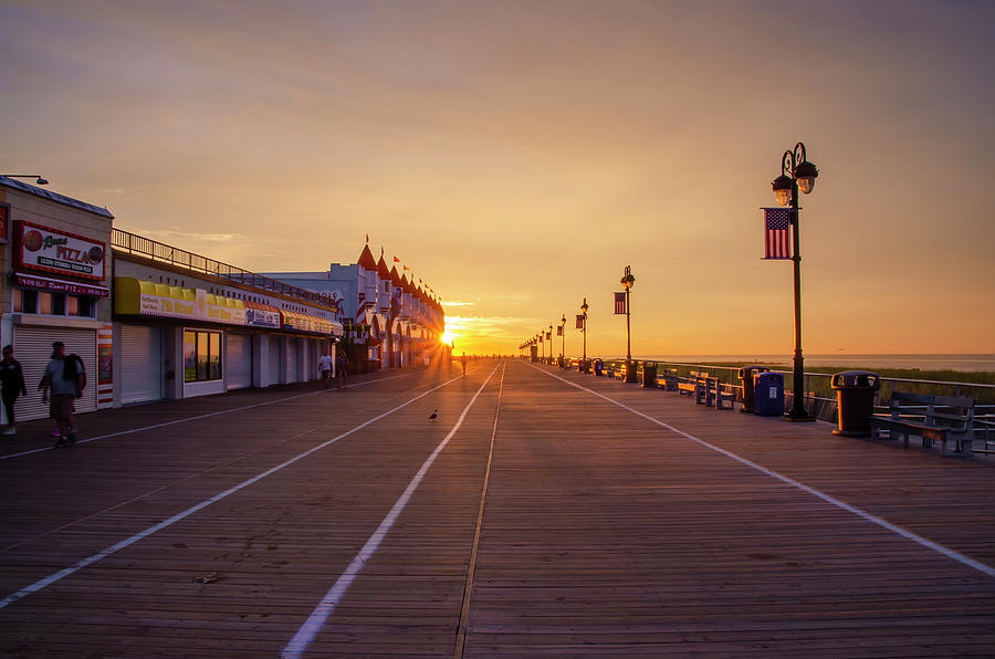Sunrise - Ocean City on the Boardwalk Photograph by Bill Cannon