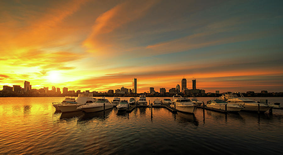 Sunrise over Boston city with boat and harbor Photograph by Anek Suwannaphoom