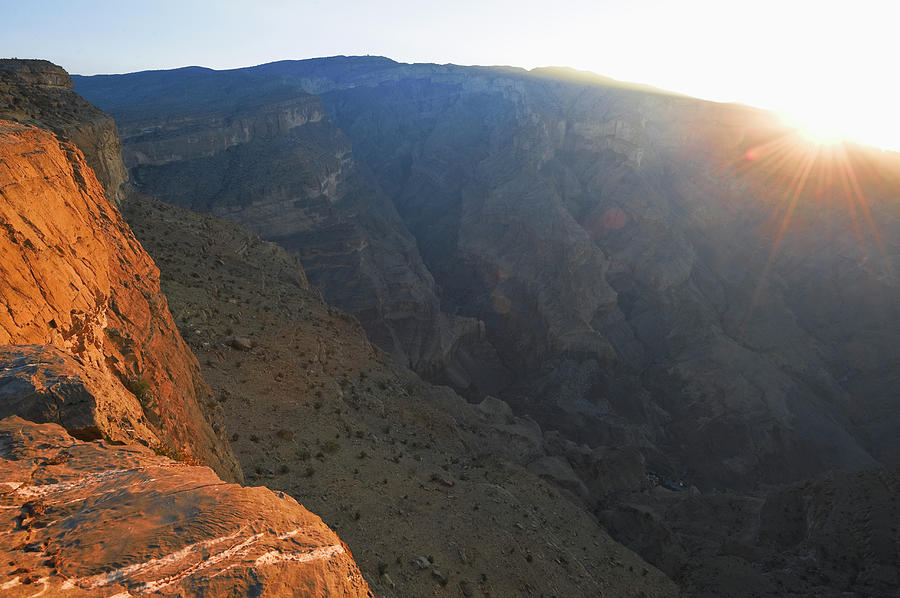 Sunrise Over Canyon, Oman Photograph by Franz Aberham