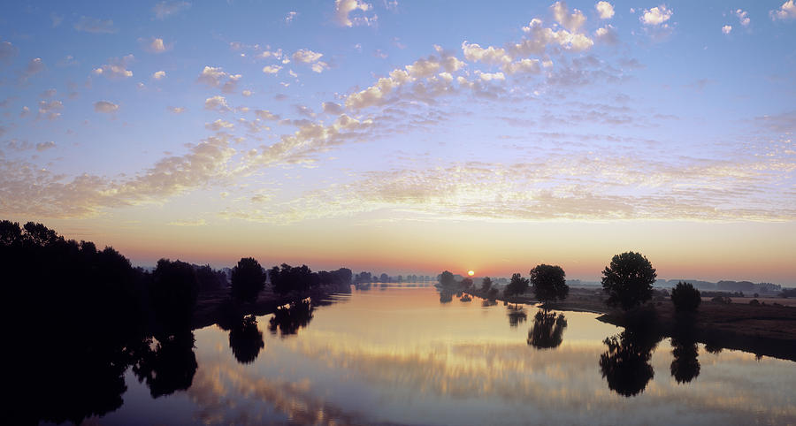 Sunrise Over River Mass Photograph by Eschcollection