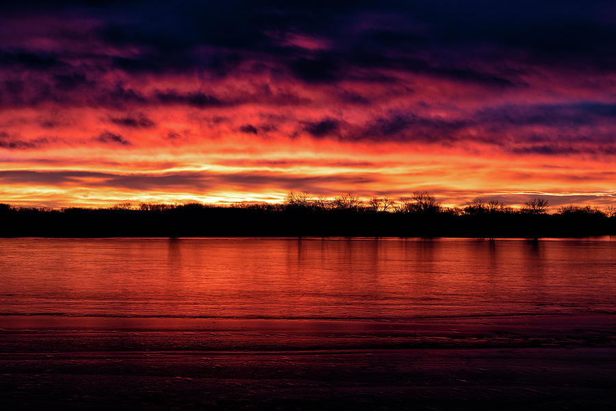 Sunrise Sets the Sky and Ice on Fire Photograph by Tony Hake