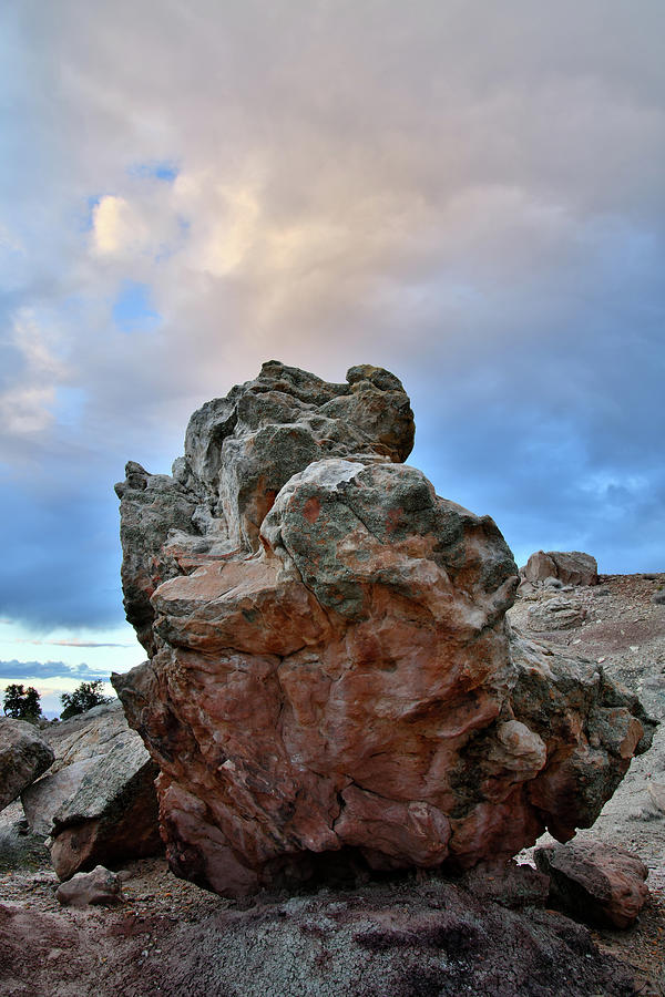 Sunset Above Colorful Boulder in Bentonite Site Photograph by Ray Mathis