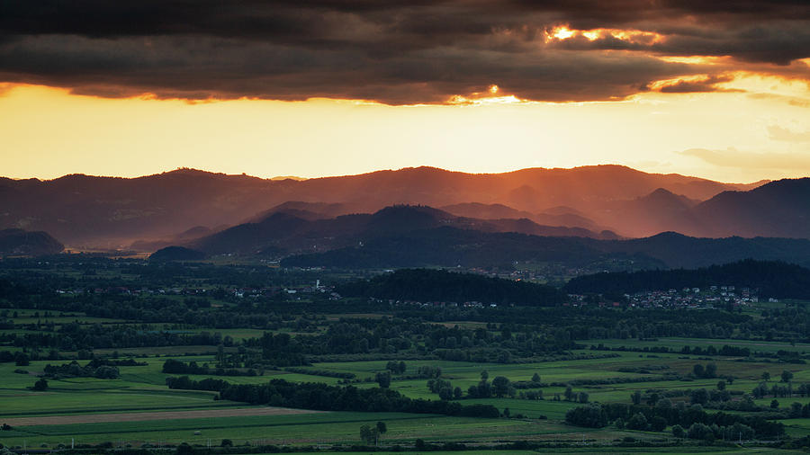 Sunset across the Barje Photograph by Ian Middleton