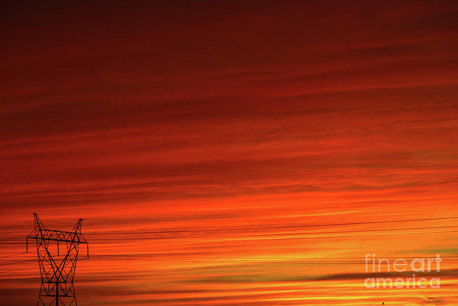 Sunset and electricity Photograph by Les Palenik