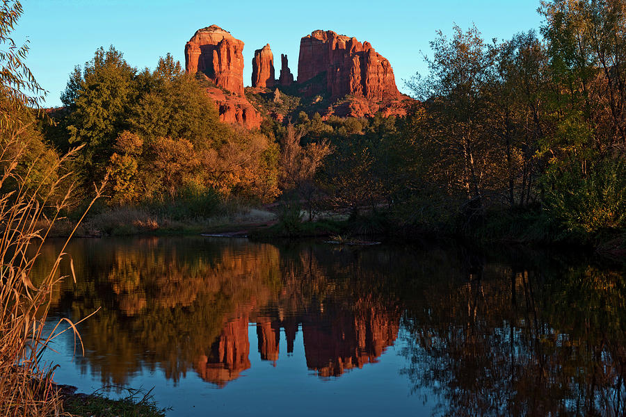 Sunset And Reflections At Red Rock Photograph by Amritendu Maji