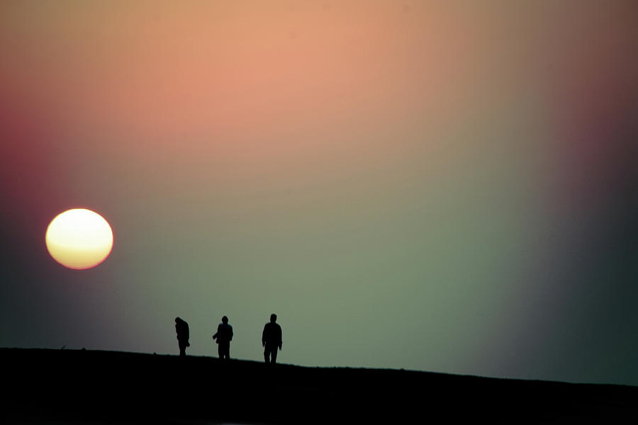 Sunset And The Three Men Photograph by Sen Lin Photography