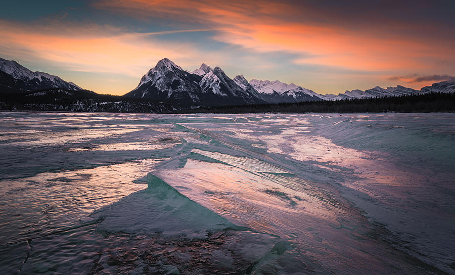 Sunset At A Frozen Lake Photograph by Bing Li