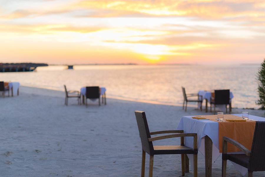 Sunset Photograph - Sunset Beach Scene  Tropical Restaurant by Levente Bodo