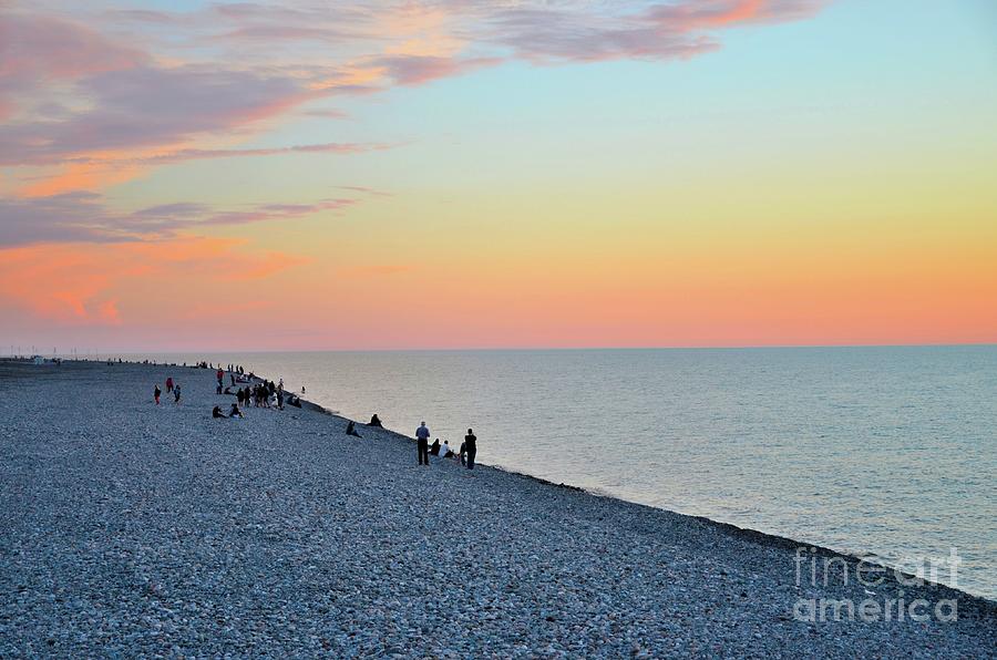 Nature Photograph - Sunset evening at rocky Black Sea beach seashore Batumi Georgia by Imran Ahmed
