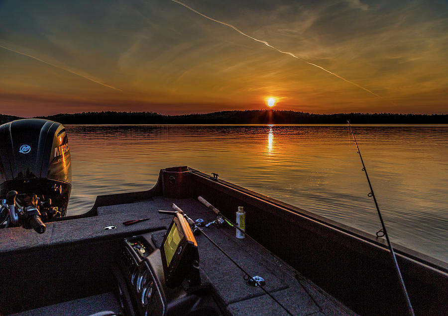 Sunset fishing Dog Lake Photograph by Joe Holley