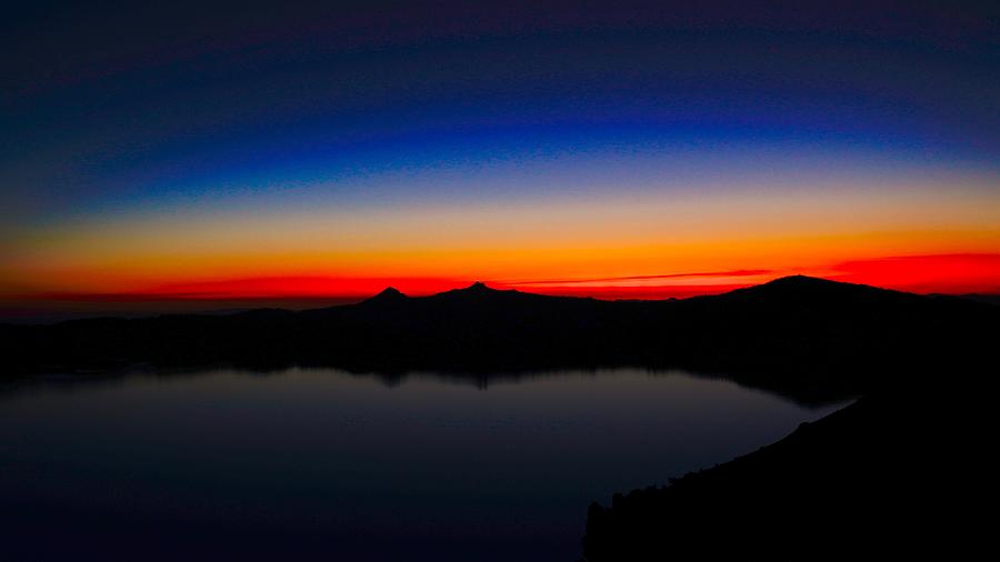 Sunset Glow at Crater Lake Photograph by Brent Bunch