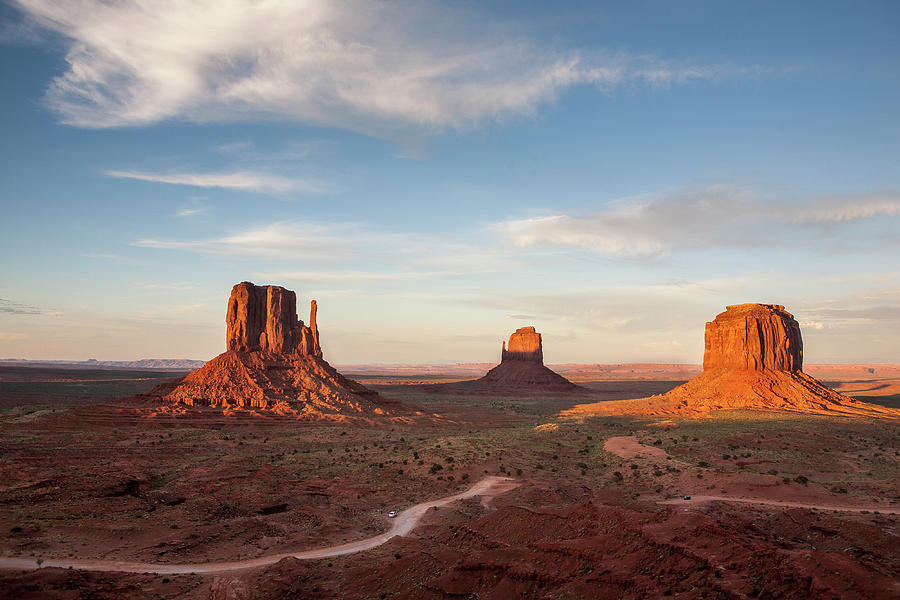 Sunset Light Hits The Iconic Rock Formations In Monument Valley, Az ...