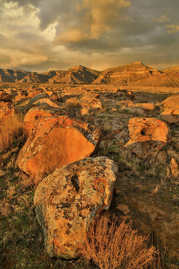 Sunset on Book Cliffs and Boulders Photograph by Ray Mathis