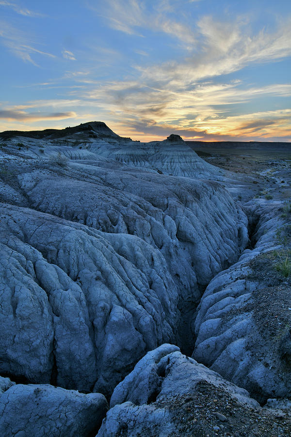 Sunset on Eroded Dunes of Petrified Forest NP Photograph by Ray Mathis