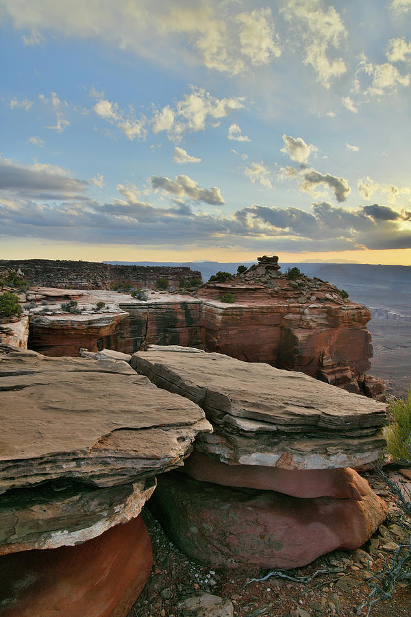 Sunset on Smors Rocks in Canyonlands Photograph by Ray Mathis