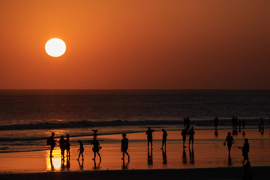 Sunset On The Beach, With A Lot Of People. Photograph by Anne Ponsen