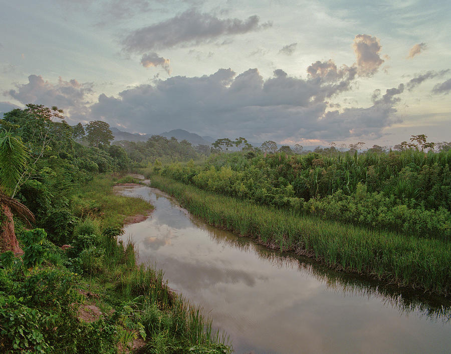 Sunset Over An Amazon Jungle River Photograph by Linka A Odom