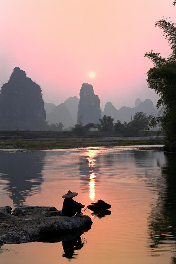 Sunset Over In Yangshuo, China Photograph by Kingwu