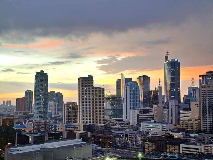 Sunset Over  Makati City, Manila Photograph by Neil Howard