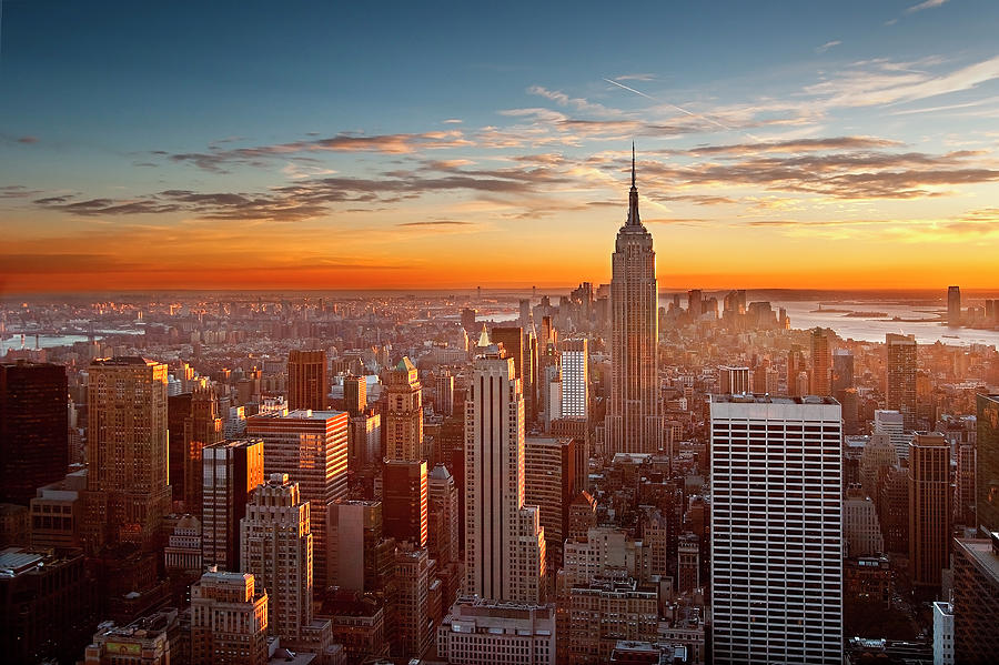 Sunset Over Manhattan Photograph by Inigo Cia