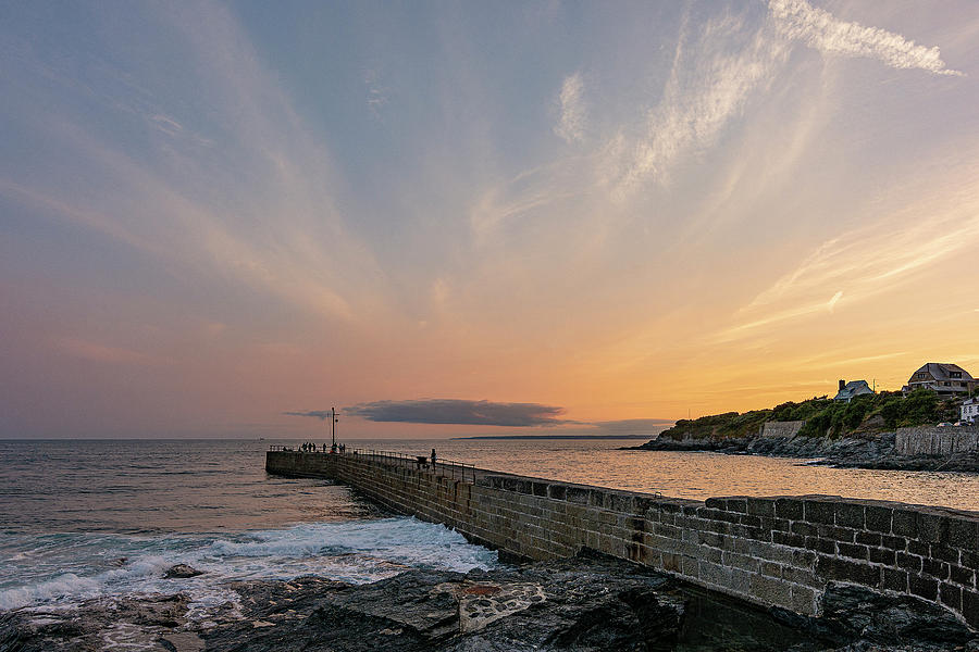 Sunset over Porthleven Pier Photograph by Hazy Apple