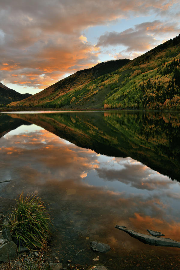 Sunset over Red Mountain Pass Reflected in Crystal Lake Photograph by Ray Mathis