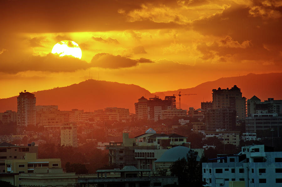 Sunset Over Santo Domingo Photograph by Urs Blickenstorfer