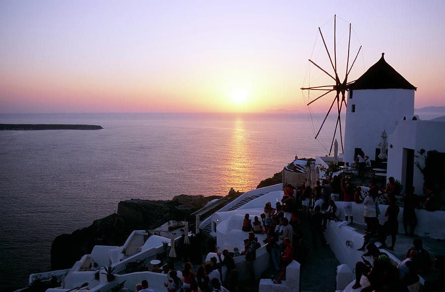 Sunset Over The Famous Village Of Oia Photograph by Domin domin